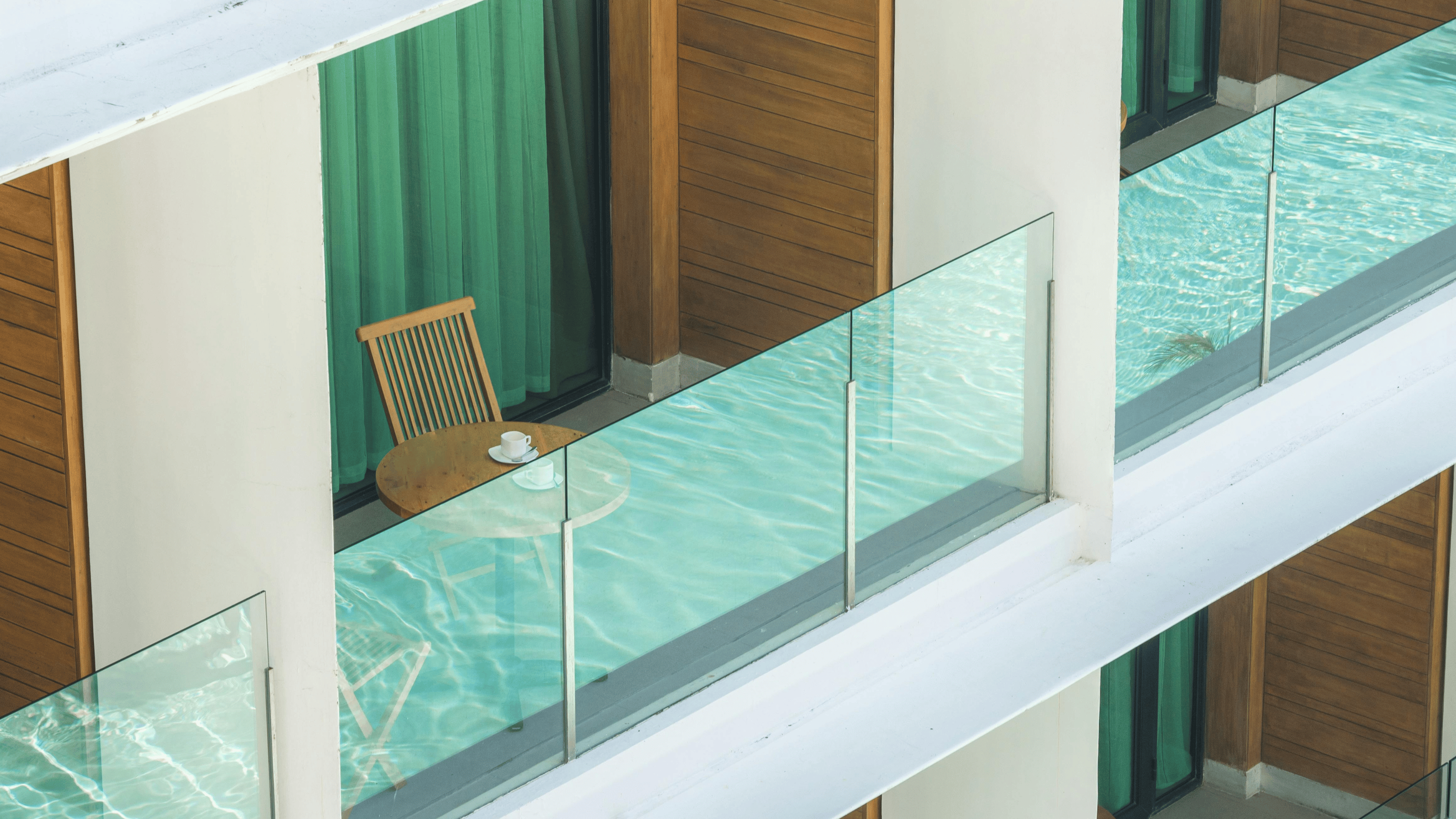 Elevate Every Space with Glass Railings